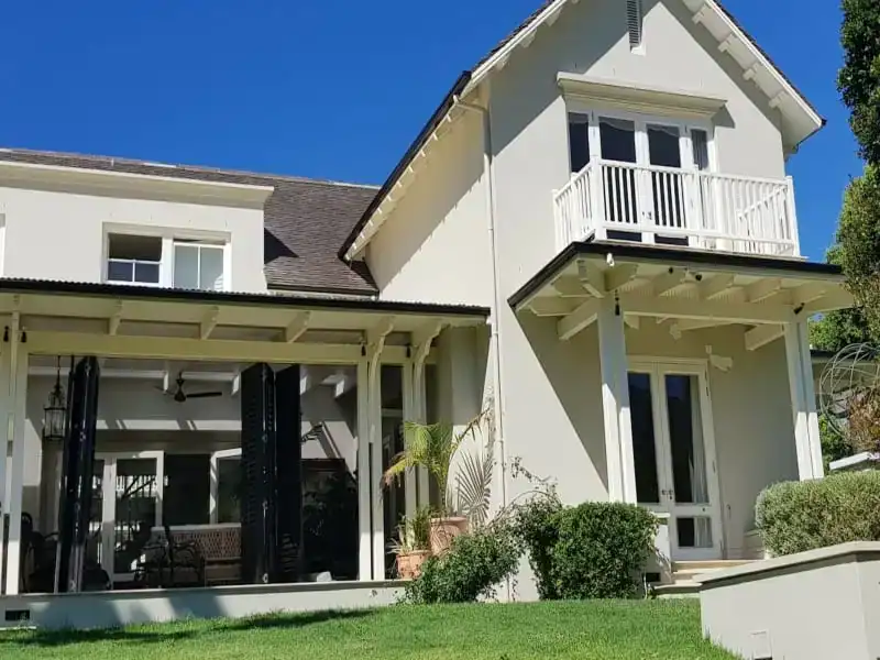 Completed Upper Bishopscourt home exterior after moisture-entry repairs and painting
