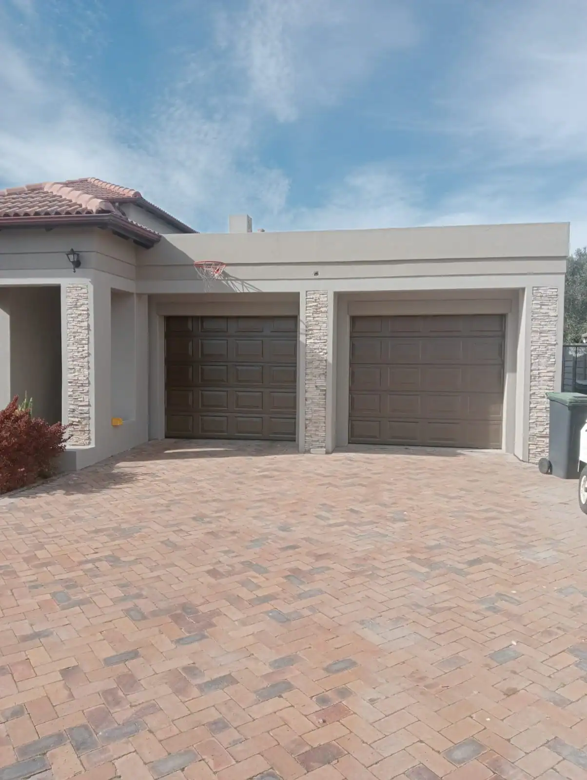 Completed garage and exterior walls after preparation and painting at Fernwood Estate in Newlands