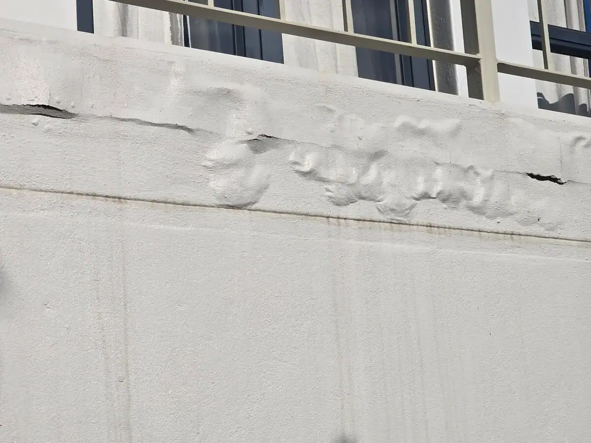Bubbling and poorly bonded exterior paint before repairs at a private home in Kenilworth Upper Cape Town
