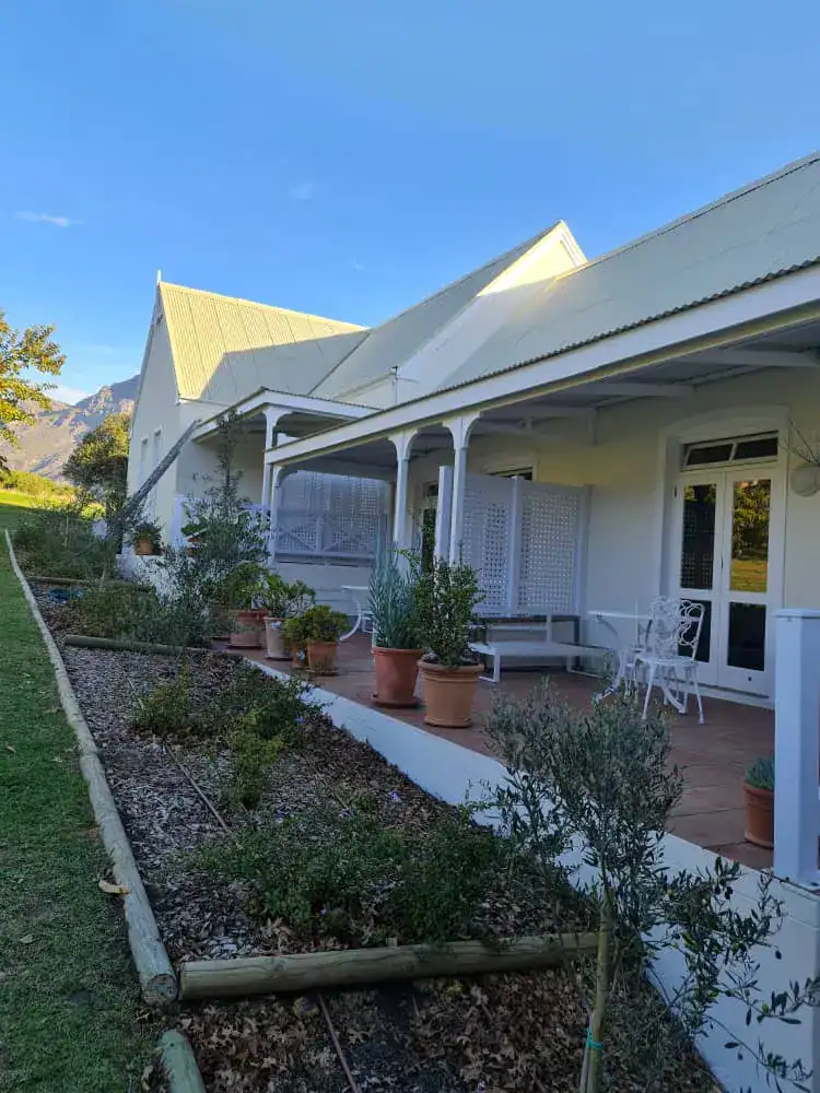 Completed exterior painting of guest cottages at Rozendal Farm in Stellenbosch