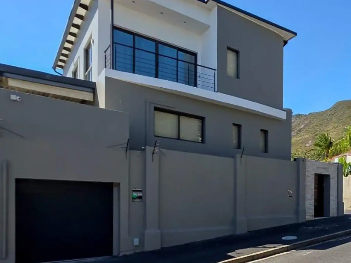 Completed exterior of a Rocklands Ridge Estate home in Simon’s Town after wall, timber and roof preparation and painting