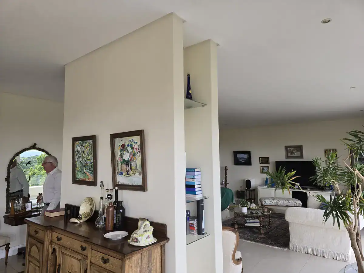 Completed living and dining areas after interior preparation and painting at a Zevenwacht Village Estate home in Kuils River