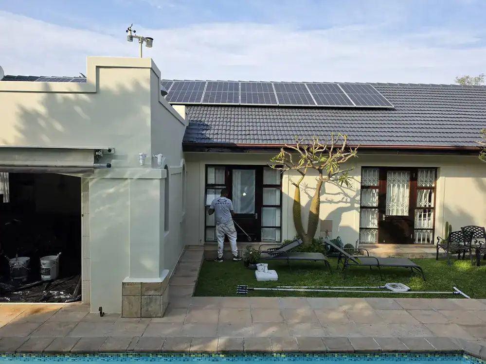 Exterior house painting in progress at a residential property in Devils Peak Estate, Vredehoek