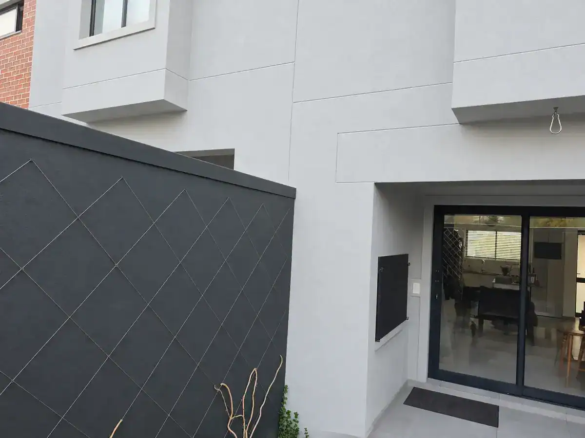 D’Landen Estate townhouse expansion joints after flexible sealing and exterior repainting