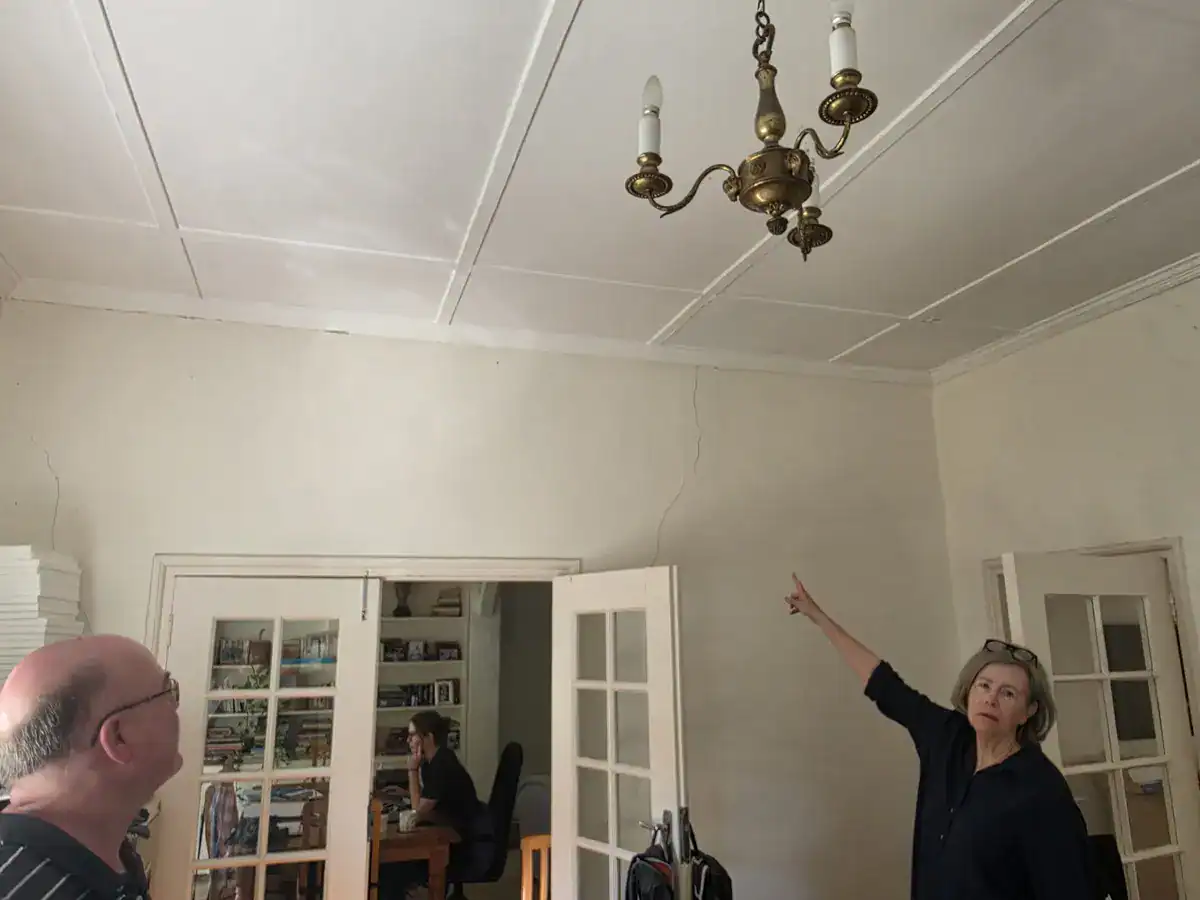 Interior walls and decorative ceiling before preparation and repainting at a residential property in Gardens, Cape Town