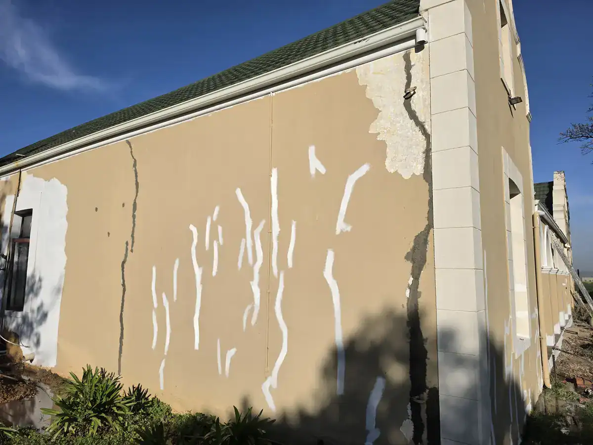 Extensive crack and damaged plaster repairs before exterior painting in Paradyskloof Stellenbosch