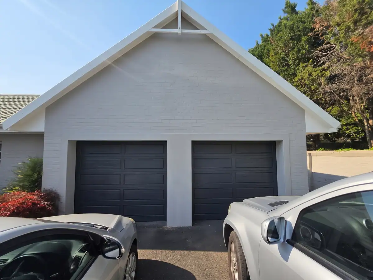 Completed garage exterior painting at a residential property in The Village, Oranjezicht