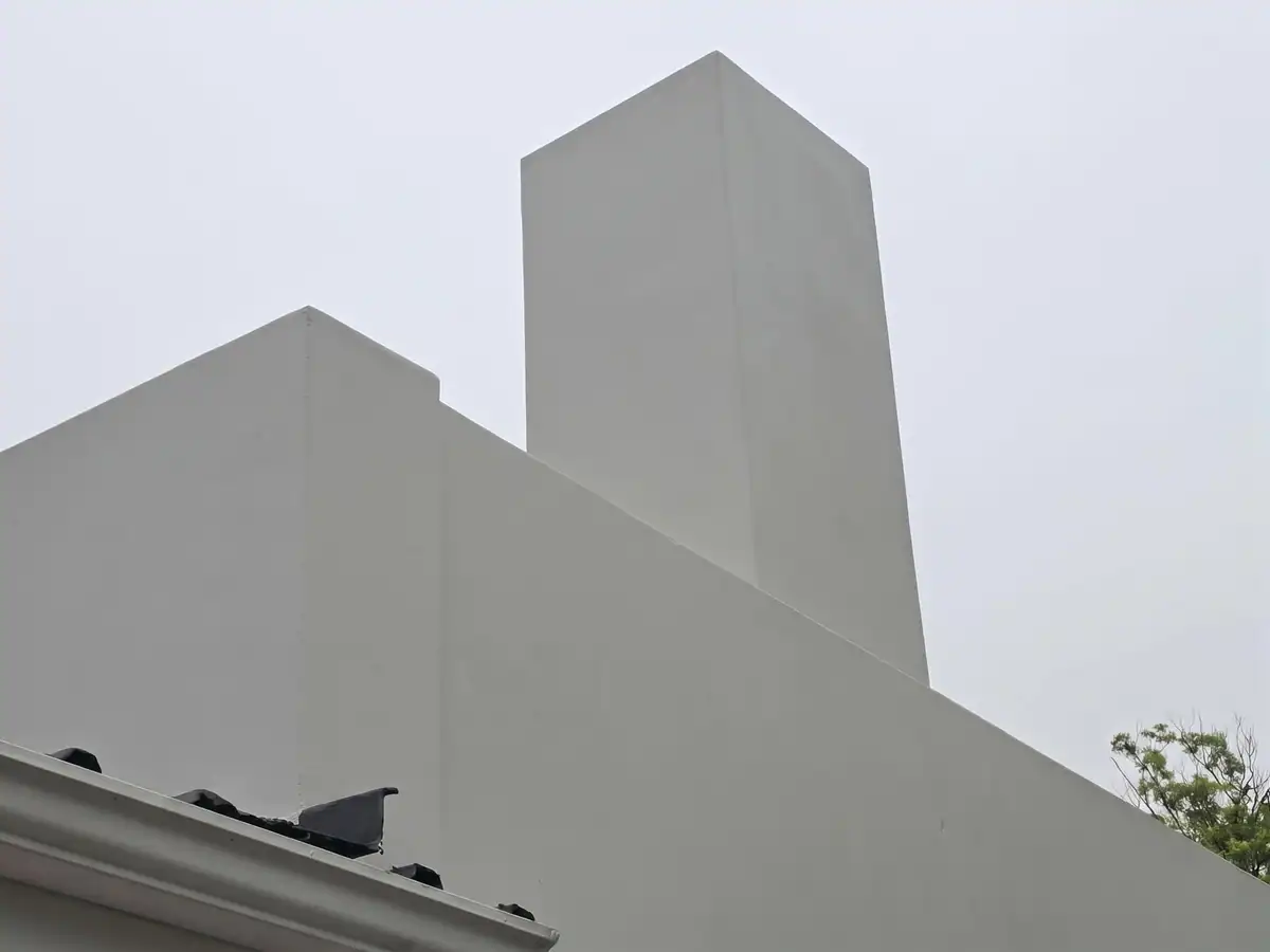 Completed chimney and exterior wall painting at a residential property in Upper Oranjezicht, Cape Town