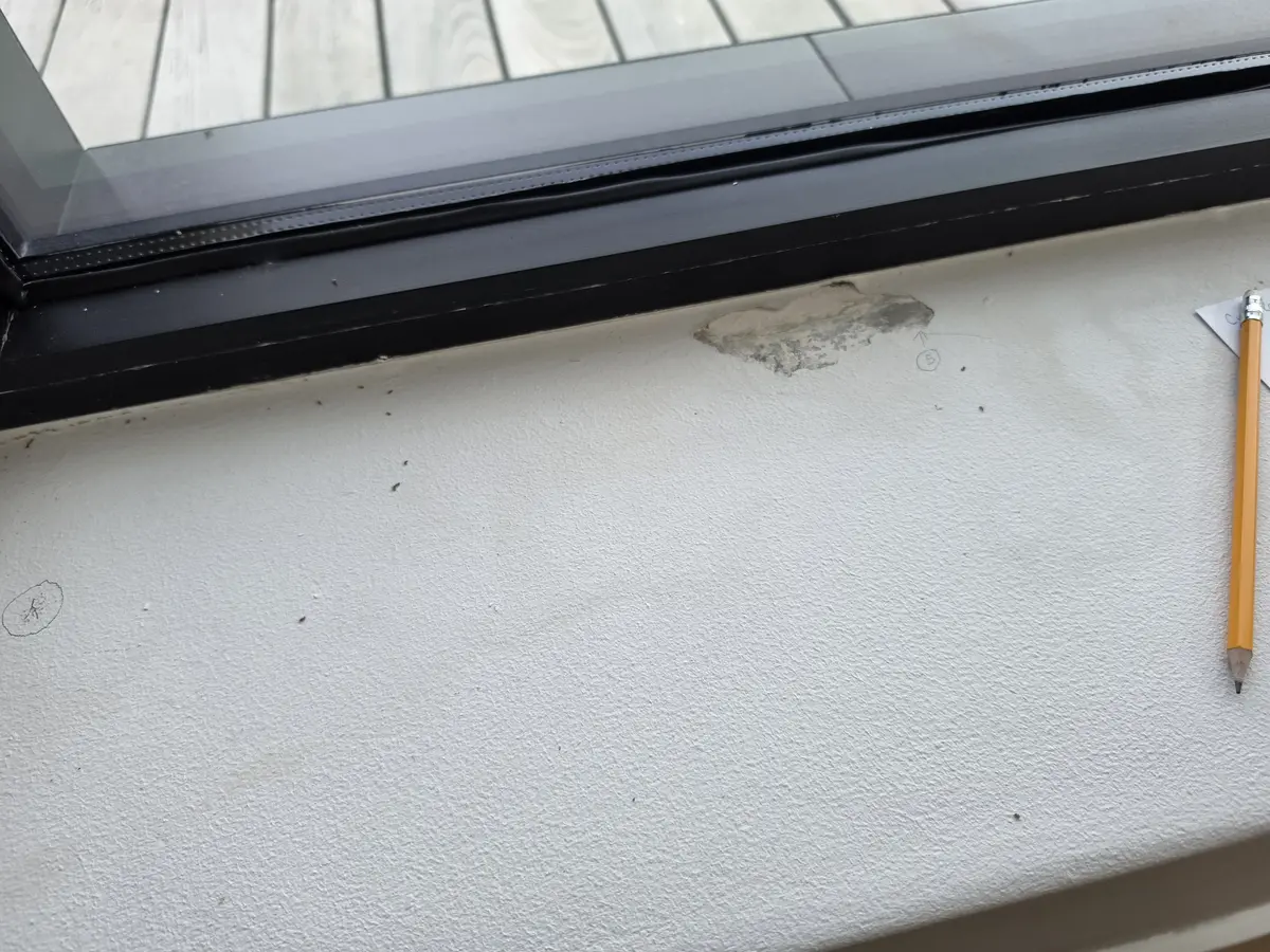 Peeling paint and exposed substrate on an interior windowsill in Vygeboom, Durbanville.